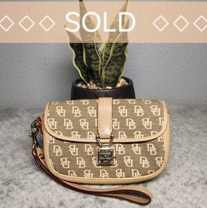 Authentic Dooney and Bourke Signature Pouch Wristlet - Price is FIRM